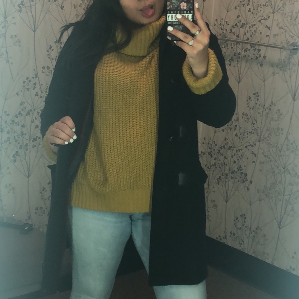 A sweater mustered color